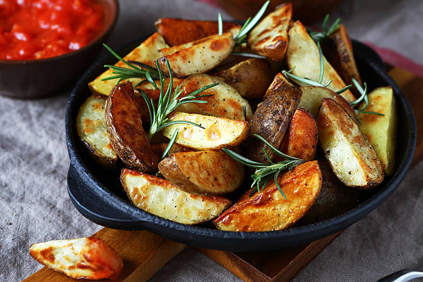 istock Nourishing potatoes in a pan 484683998