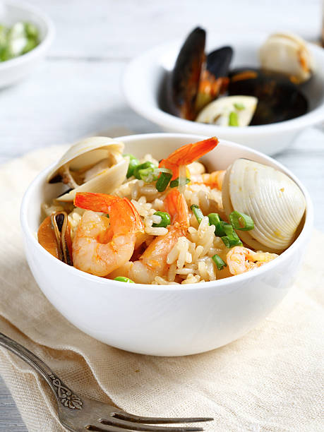 istock Rice with seafood in a bowl 484684014