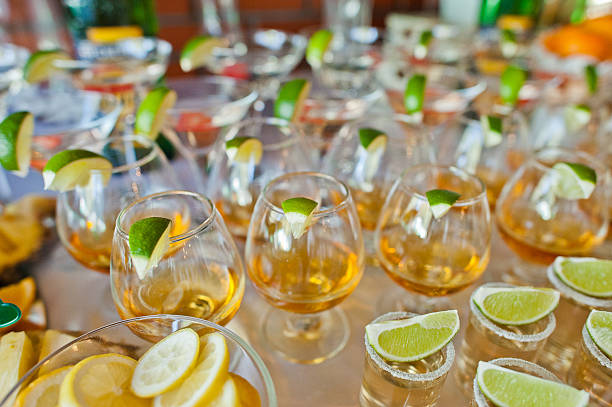 istock Glasses with lime and tequila at wedding reception 484684054