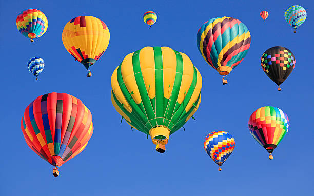istock Multicolored hot air balloons flying 484685048