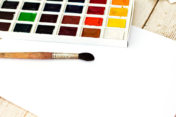 istock Workplace artist - paper, paint, brushes, color wheel 484686262