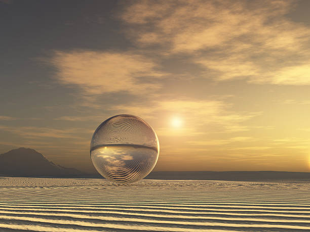 istock Glass sphere in a desert landscape 484690862