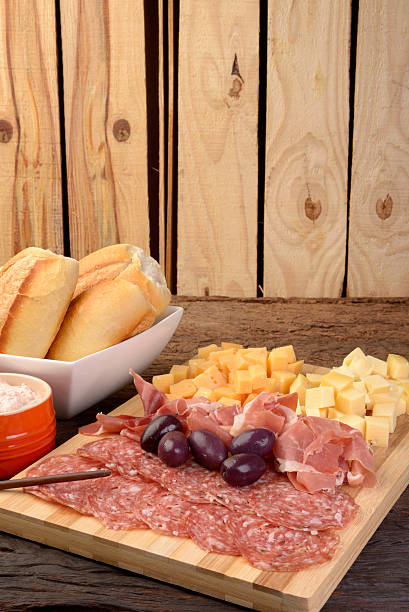 istock Charcuterie and Cheese Platter, Bread, Olives and Dippings 484693256