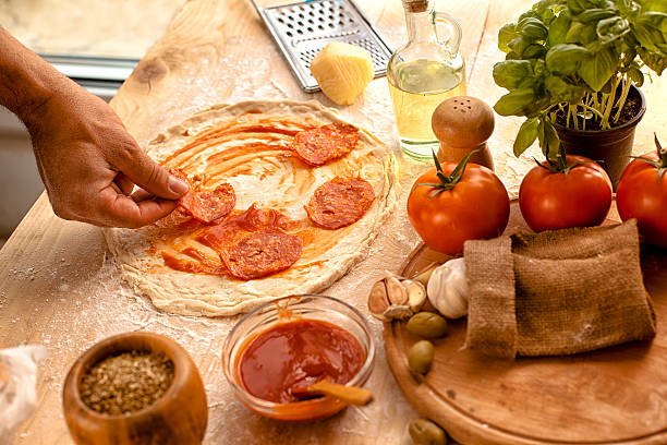 istock Preparing ingredients of homemade pizza 484701554