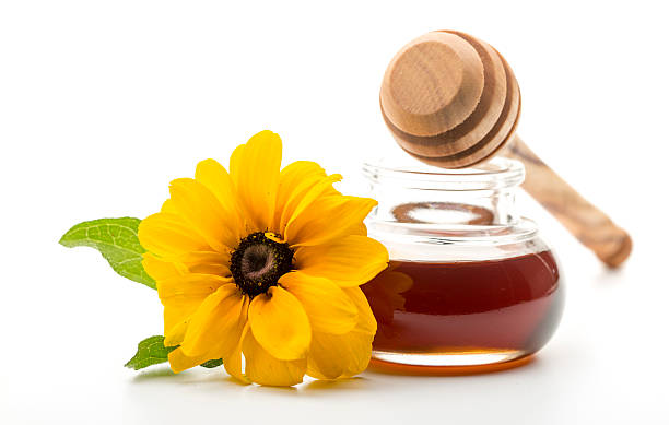 istock Fresh honey in a jar and honey dipper 484706332