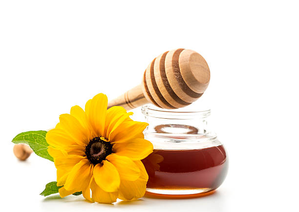 istock Fresh honey in a jar and honey dipper 484706798