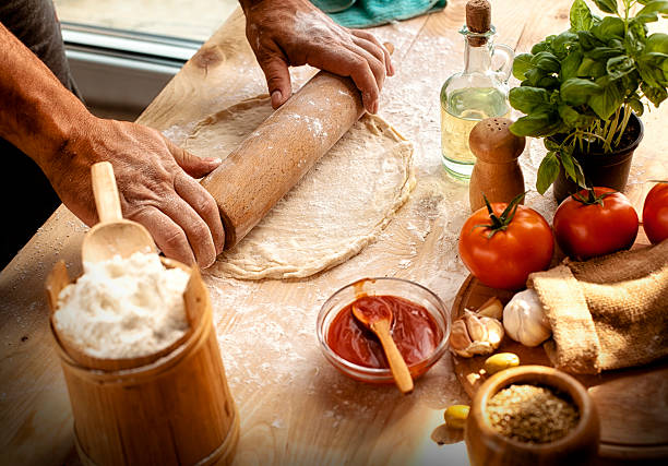 istock Preparing ingredients of homemade pizza 484707496