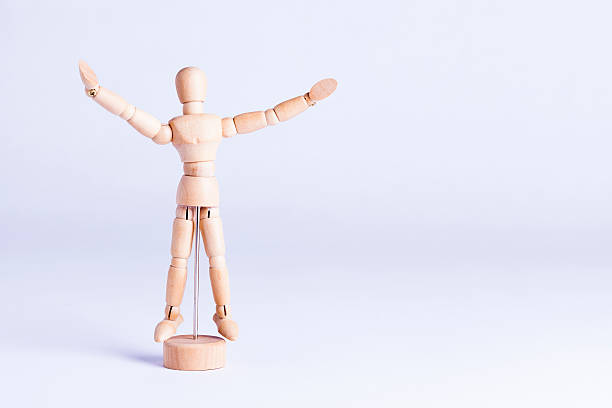 istock wooden mannekin on white background 484707680