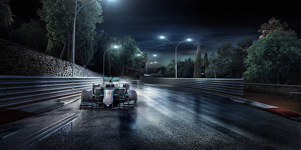 coche de carreras fórmula uno en la pista - motor racing track sports race car motorized sport fotografías e imágenes de stock