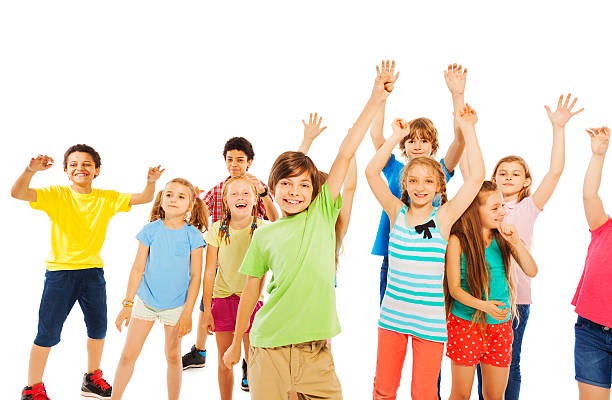 istock Boys and girls very happy raising hands 484711284
