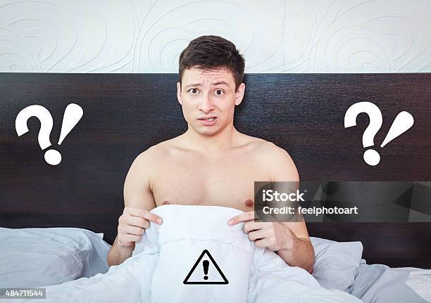 Young Man Thinking About Impotency Problems And Prostate Stock Photo - Download Image Now