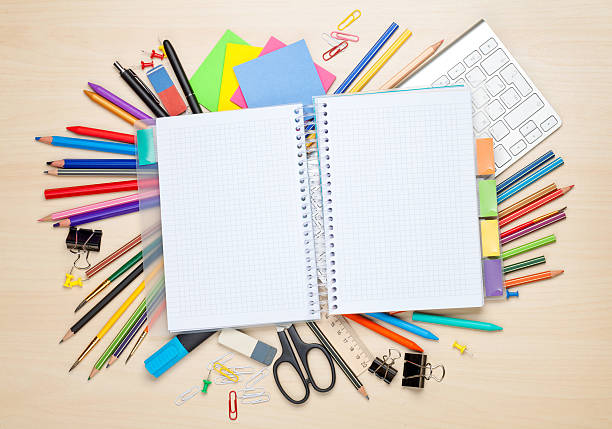 istock Blank notepad over school and office supplies 484712370