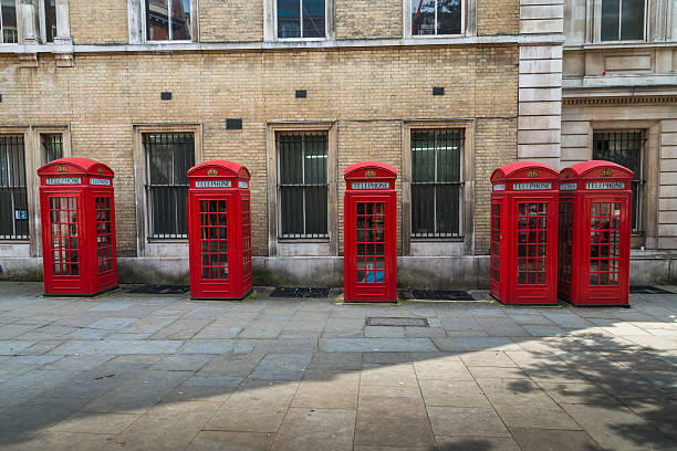 istock Row of red phone boxes London 484712808