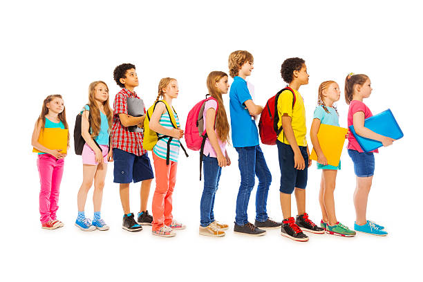 Children walking to school holding hands