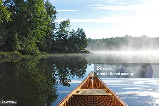 Cedar Canoe Bow On A Misty Lake Stock Photo - Download Image Now - Summer, Cottage, Muskoka