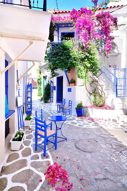 istock Narrow whitewashed street of Skiathos, Greece 484717771