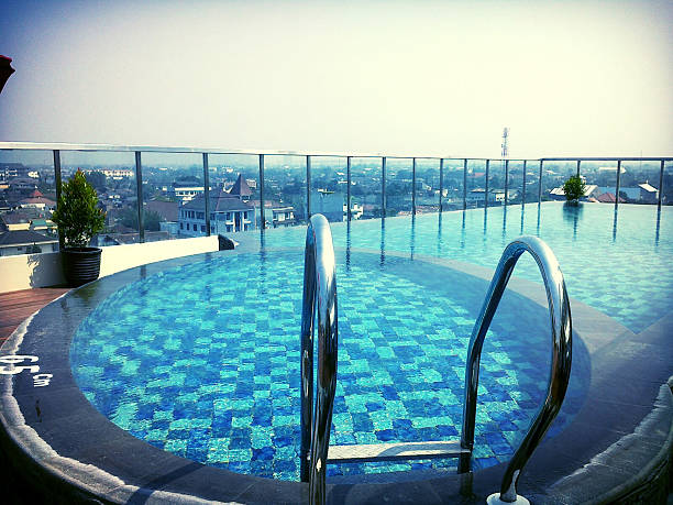 Swimming Pool At the Roof Swimming pool at the roof of a high building paris metro sign stock pictures, royalty-free photos & images