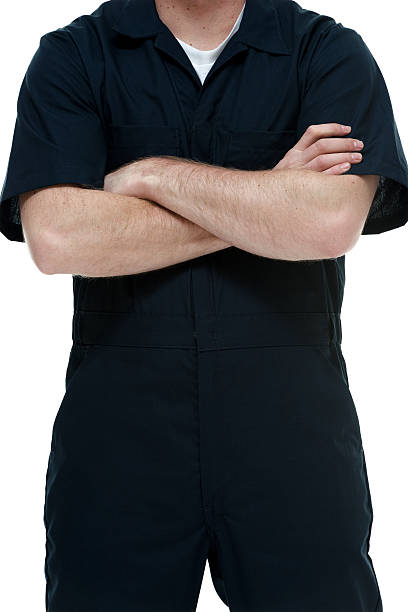 istock Mechanic standing with arms crossed 484726620
