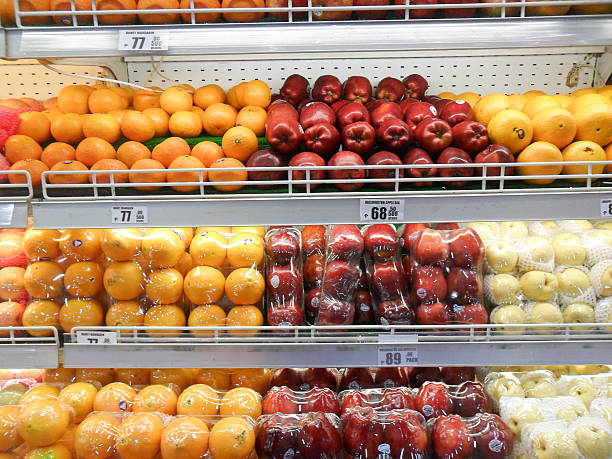 istock apples,oranges,pears in grocery 484734138