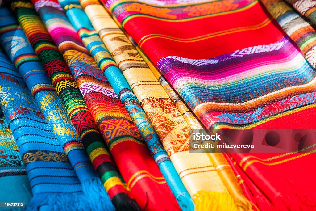 Colorful Mexican serapes hang in row Colorful Mexican serapes hang in row. Mexican rugs from palenque, mexico 2015 Stock Photo