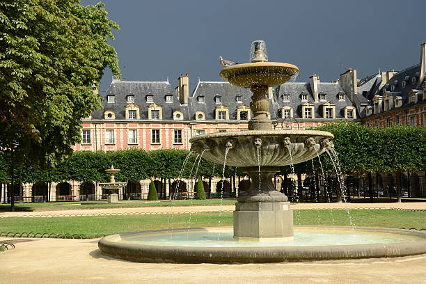 istock Place des Vosges in Paris in Between Rain Showers 484737618