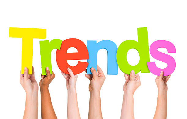 istock Multi Ethnic People Holding The Word Trends 484741595