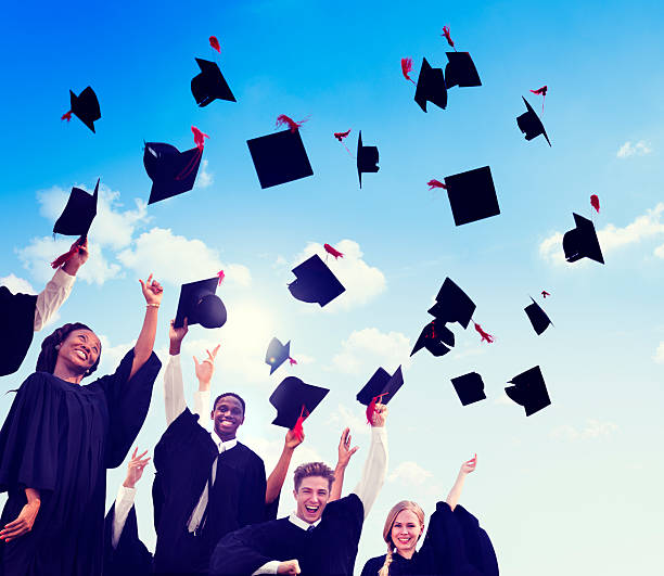 istock Group Of Diverse International Students Celebrating Graduation 484741601