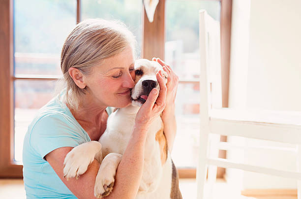 istock Senior woman with her dog 484742994