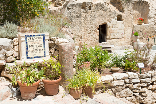 Interior view of the tomb of King David on Mount Zion in Jerusalem, Israel. The words of the 10 commandments are written in Hebrew in a silver cabinet above the tomb.