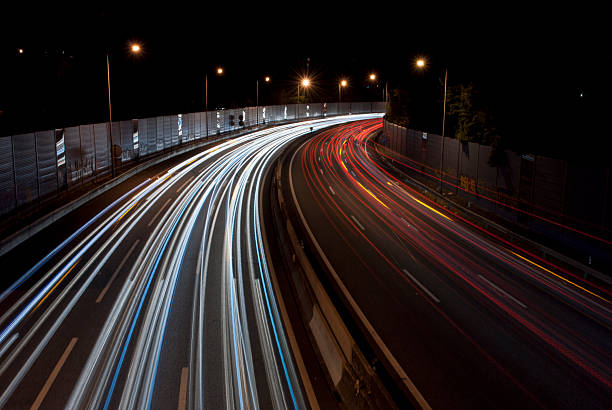 istock Highway traffic at night long exposure 484744385