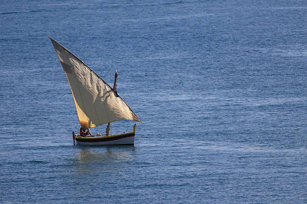 Catalan boat with its Latin sail deployed - Collioure, France.