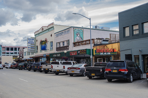 Fairbanks, Alaksa, USA.- August 3, 2015;Parked cars line 2nd Avenue the dowtown bussiness district in Fairbanks Alaska.