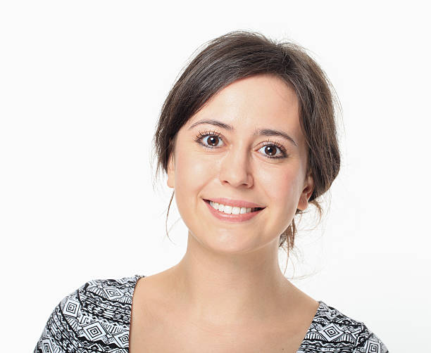 istock Happy Young Woman Smiling Portrait. 484745305
