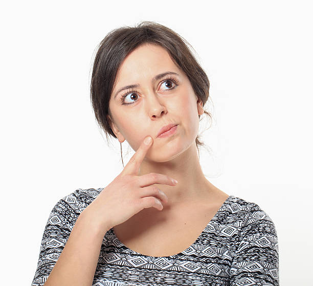 istock Thinking Young Woman Portrait. 484745315