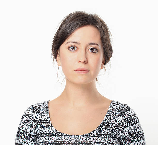 istock Serious Young Woman Portrait. 484745325