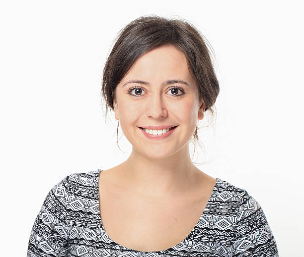 istock Happy Young Woman Smiling Portrait. 484745335