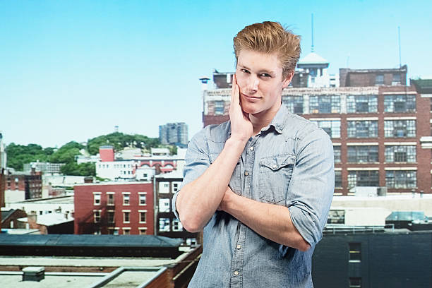 istock Happy young man standing in outdoors 484745829