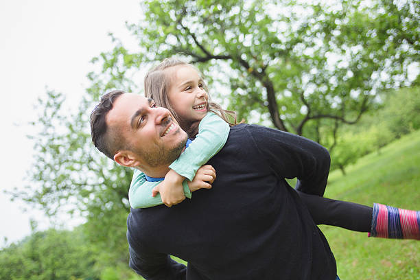 istock Father and son in forest on a meadow 484748668