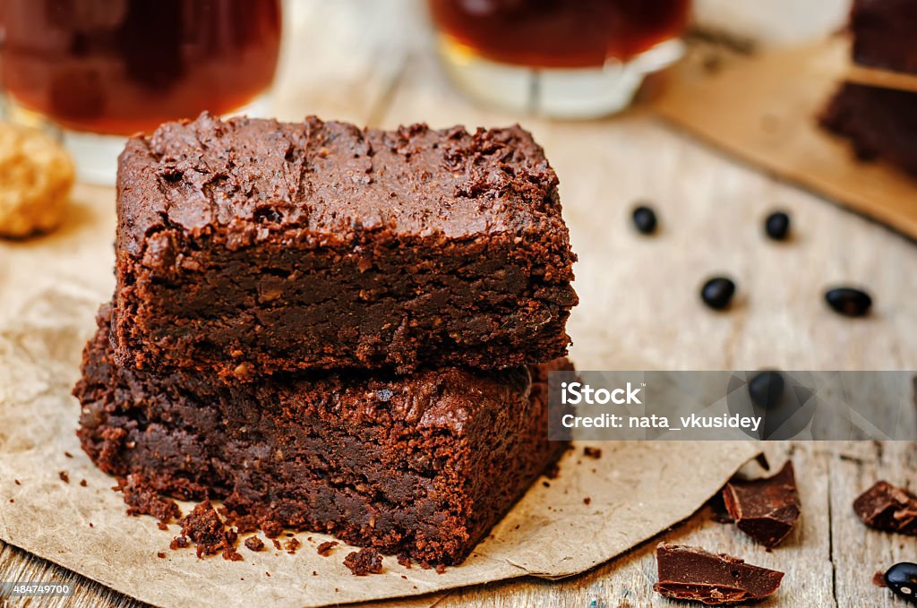 black bean brownies black bean brownies on a dark wood background. the toning. selective focus Black Bean Stock Photo