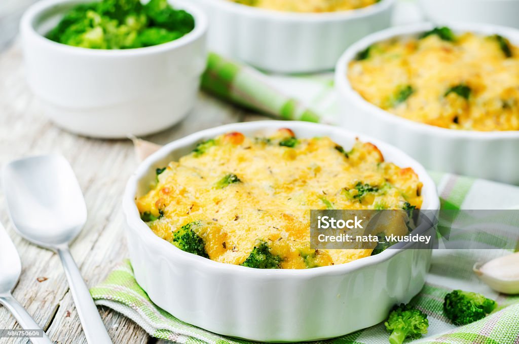 millet casserole with broccoli and cheese millet casserole with broccoli and cheese. the toning. selective focus Casserole Stock Photo