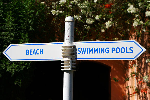 decision - beach or pool stock photo