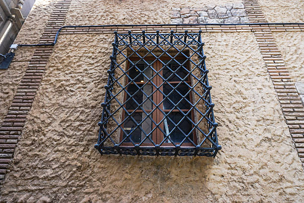 istock close-up a window in a stone wall 484756886