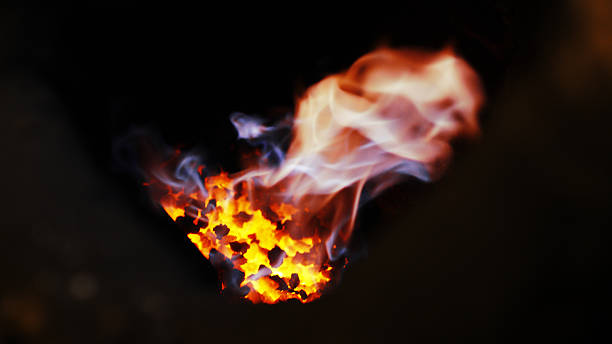 istock Smoke rising from hot coal pit in Japanese traditional oven 484757160