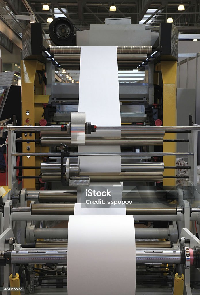 The production of plastic packages Machine from the manufacture of plastic packages from rolls Business Stock Photo