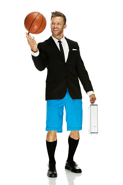 istock Split personality man with briefcase and basketball 484760163