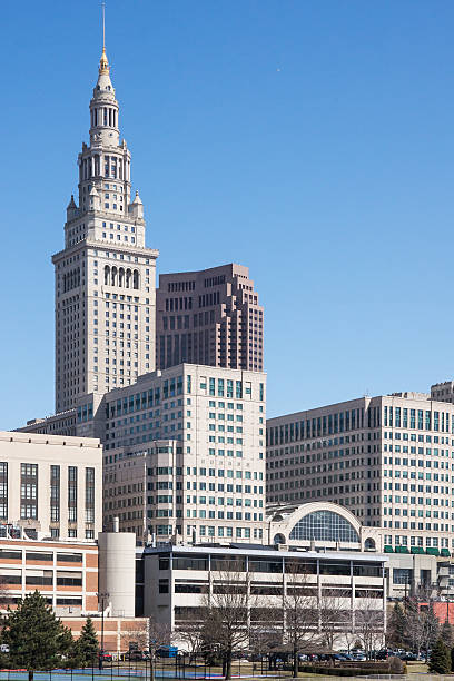 Cleveland Landmark The iconic Cleveland Terminal Tower is the centerpiece of the downtown Cleveland business district.  Also seen are the slightly shorter Huntigton Bank building and part of the Tower City complex terminal tower stock pictures, royalty-free photos & images