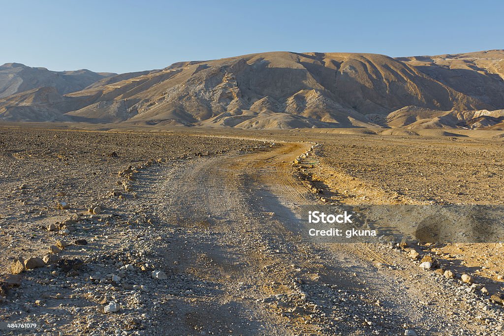 Dirt Road Dirt Road of the Negev Desert in Israel Arid Climate Stock Photo