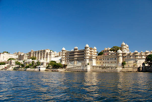 City palace Udaipur Udaipur, India - November 20, 2008: View of lake and City palace Udaipur on a sunny day lake palace stock pictures, royalty-free photos & images
