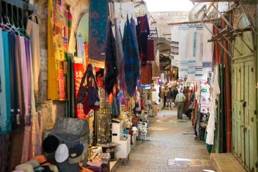 Jerusalem, Israel - July 25, 2013: Shops and people in the Muslim Quarter of Jerusalem's Old City