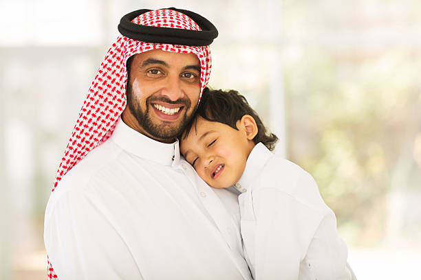 istock Arabian father holding his sleeping baby 484766922